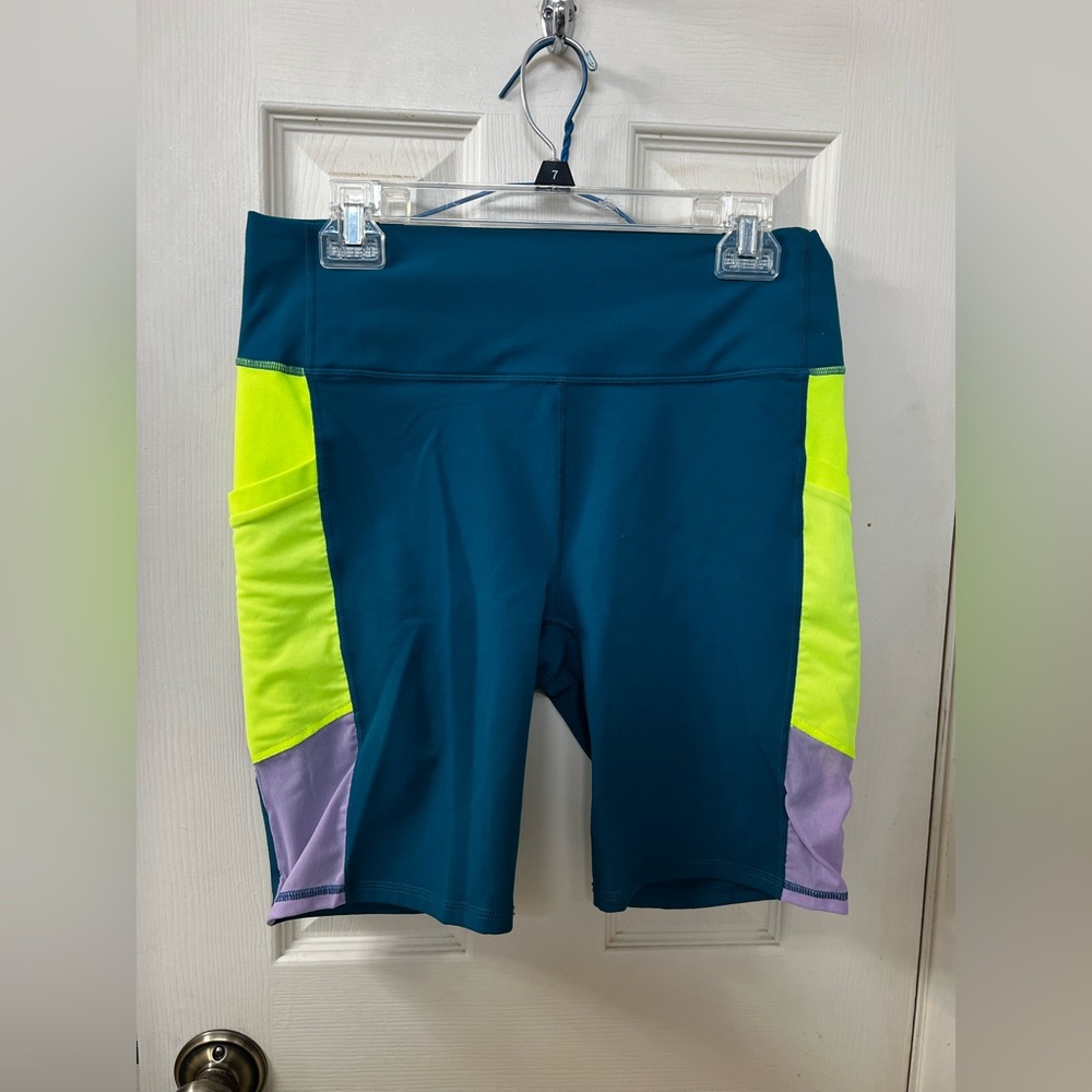 Fabletics blue and lime green biker shorts and bra set!